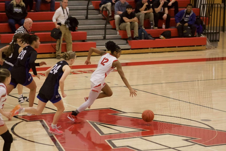 Afton player running with the ball