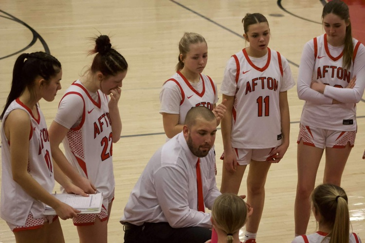 coach talking to team