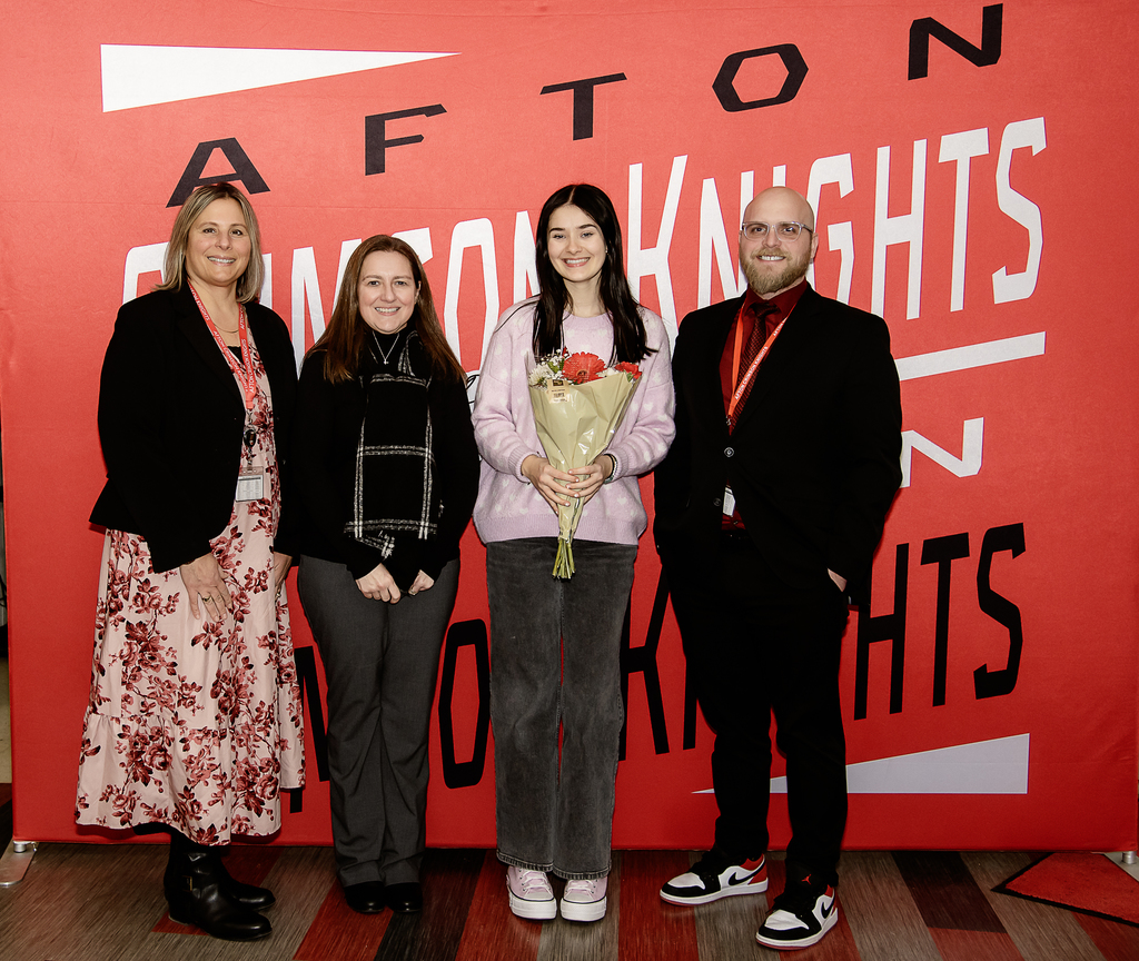 Jordan Phillips with Superintendent Hammond and Principal Carle