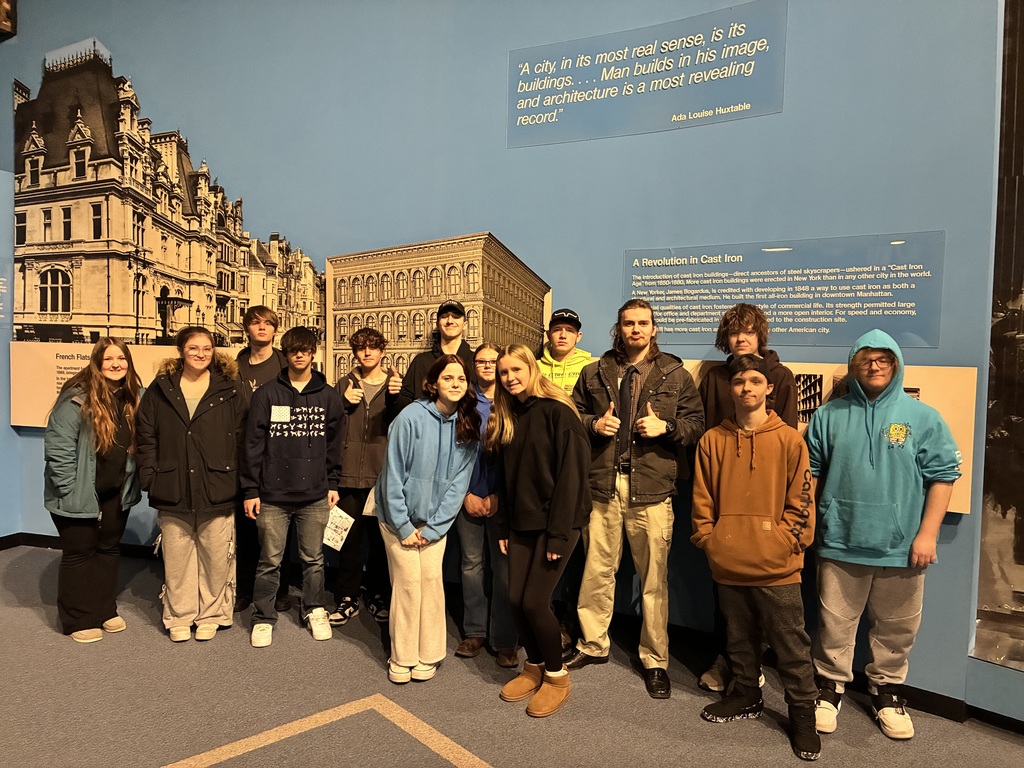 Class Photo in front of Albany display