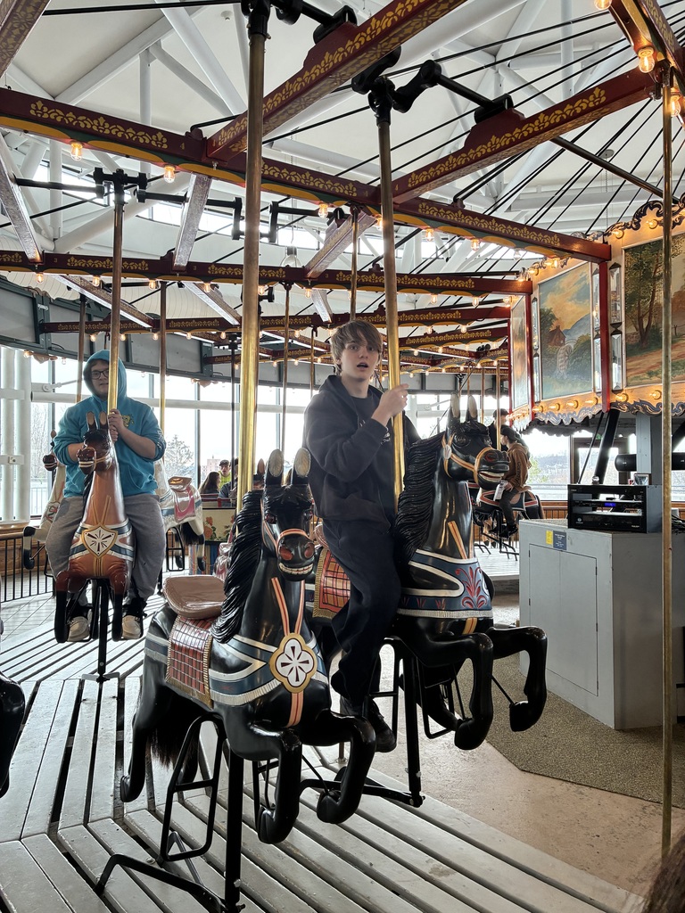 Student on merry-go-round