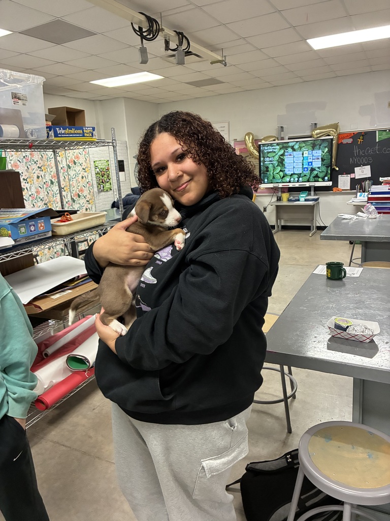 Student with puppy