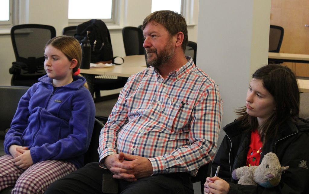 Teacher with students