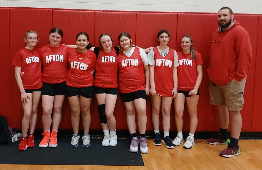 Afton basketball playerswith T-shirts