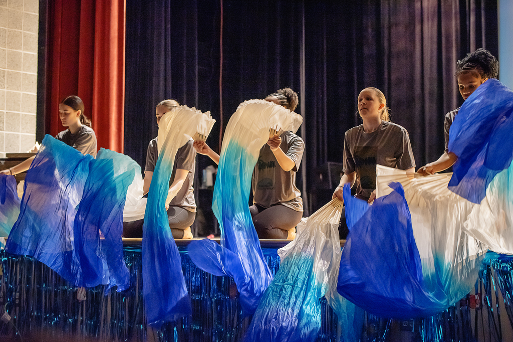 Afton drama students on stage in costume