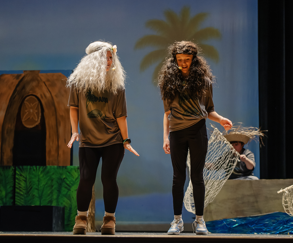 Afton drama students on stage in costume