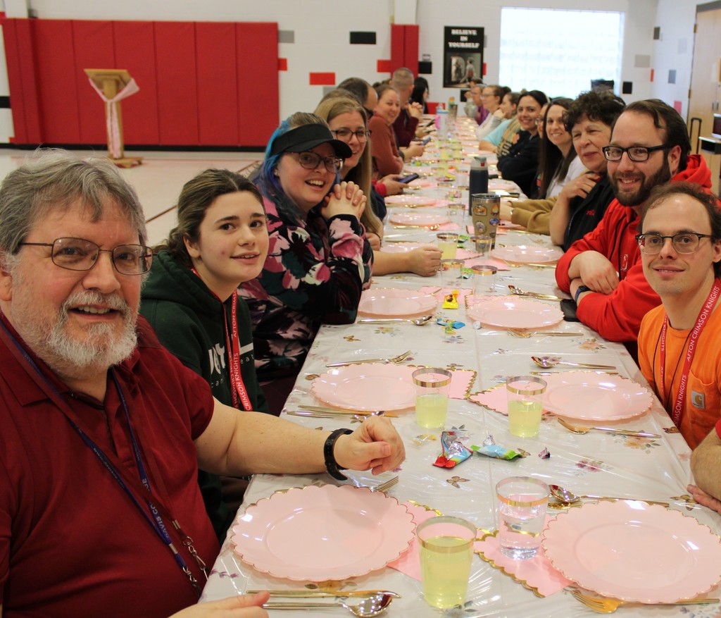 Staff smiling together
