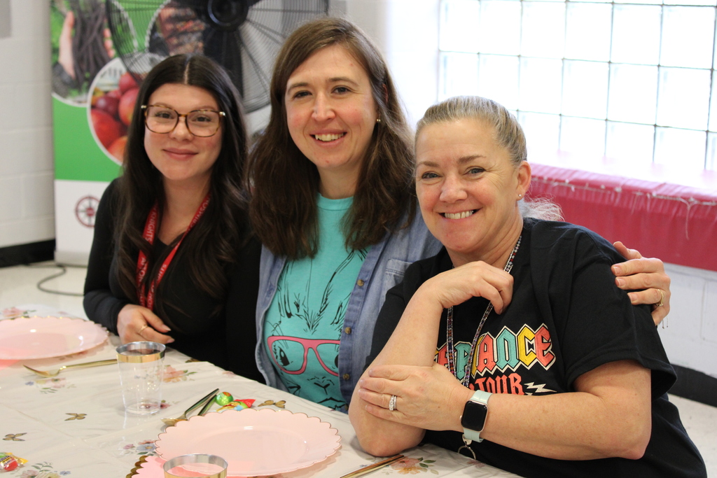 Staff smiling together