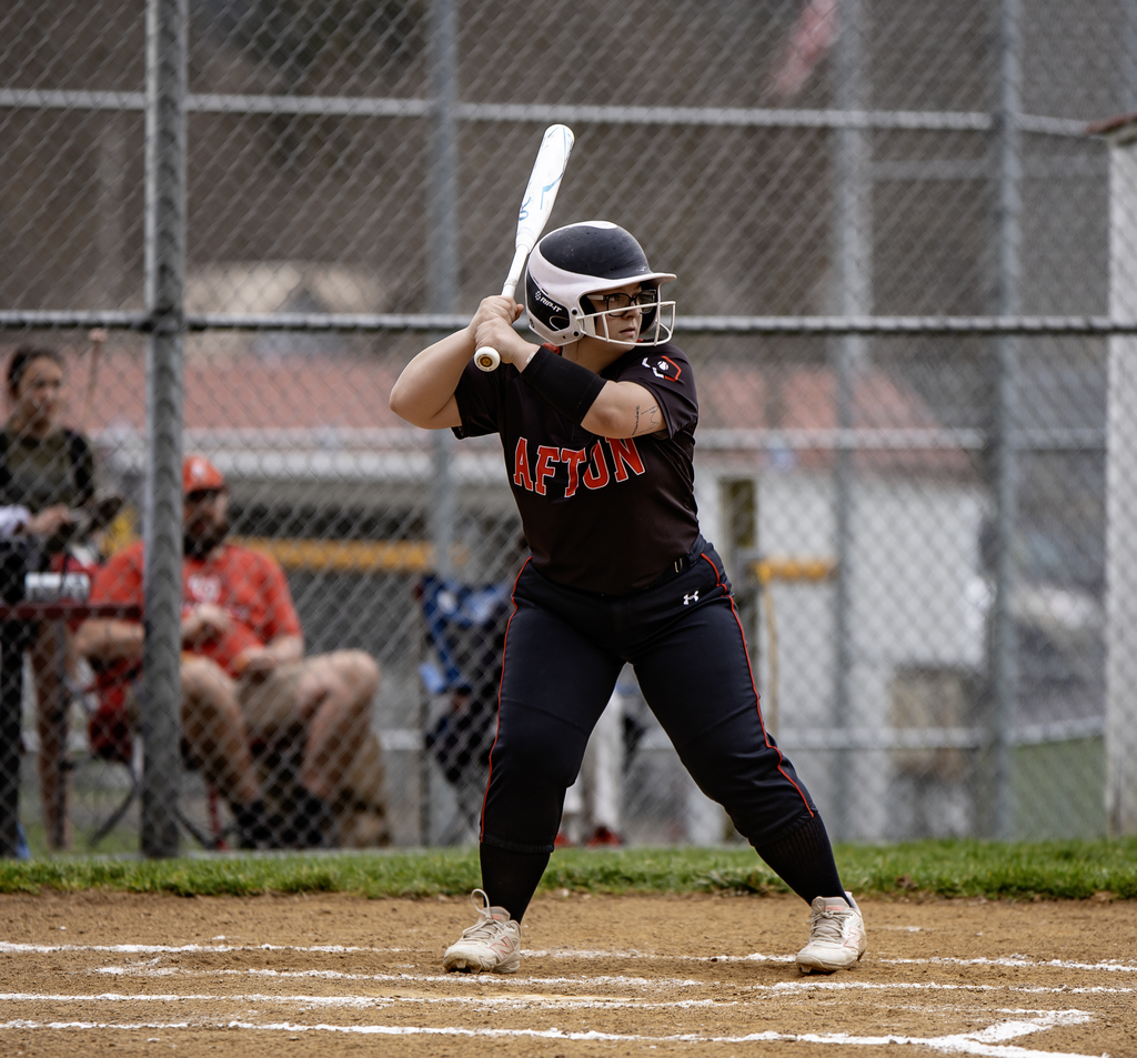 softball player at the bat