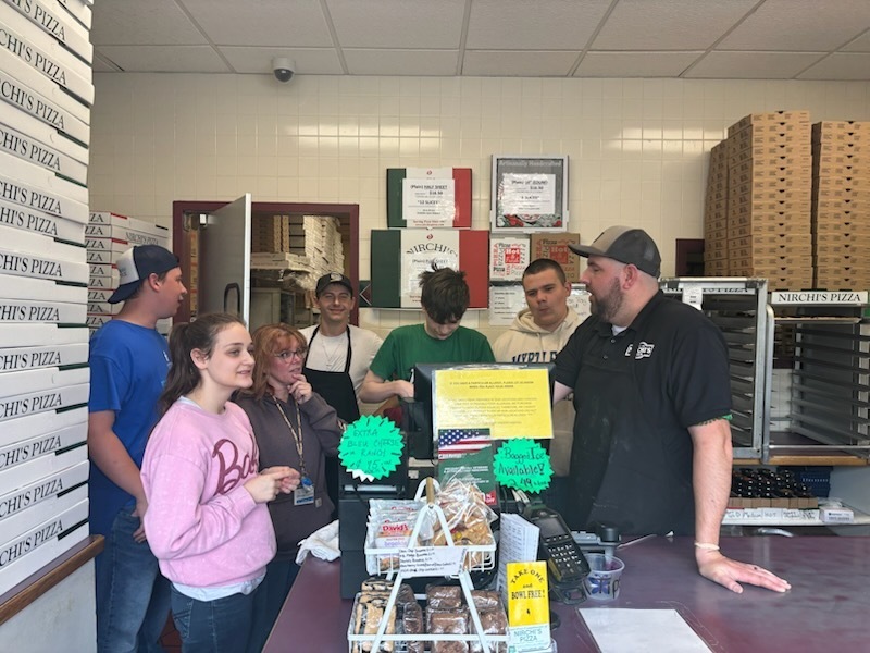 Students by the front register