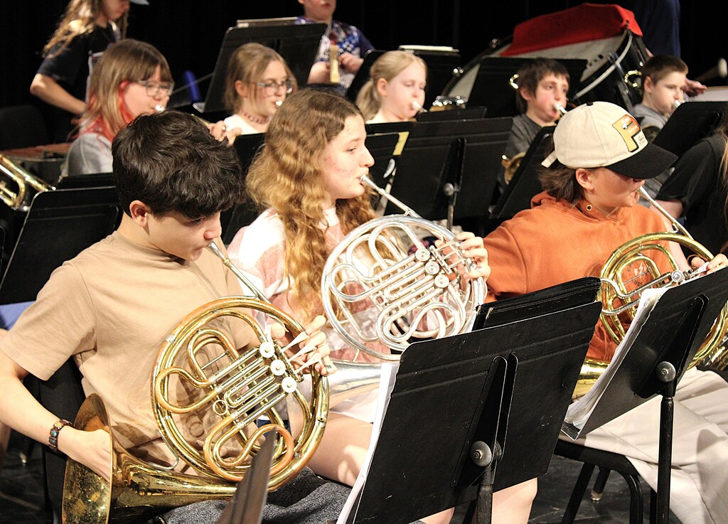 Students practicing with instruments