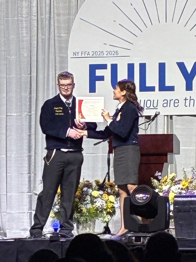 FFA student being recognized on stage
