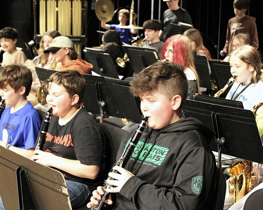 Students practicing with instruments