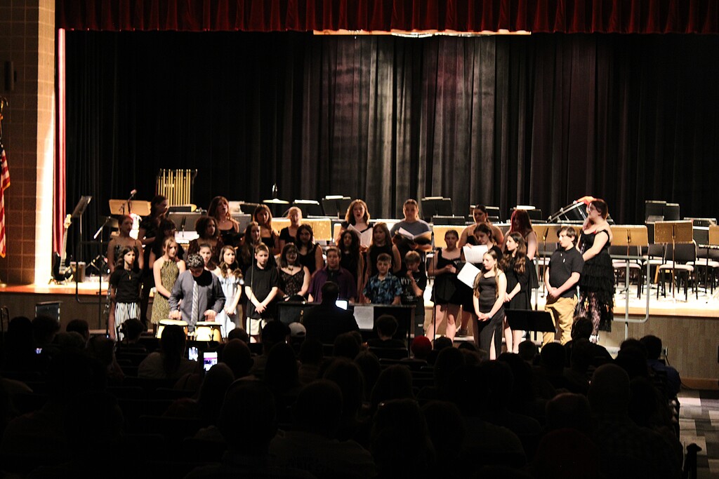 Students in choir singing