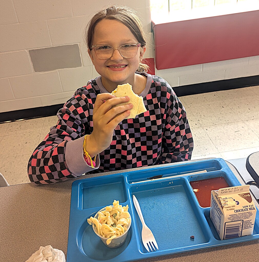 elementary student with food