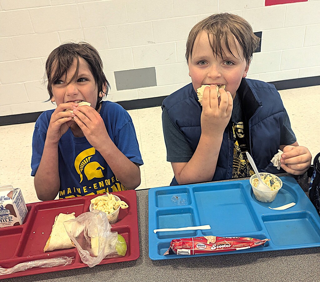 elementary students with food