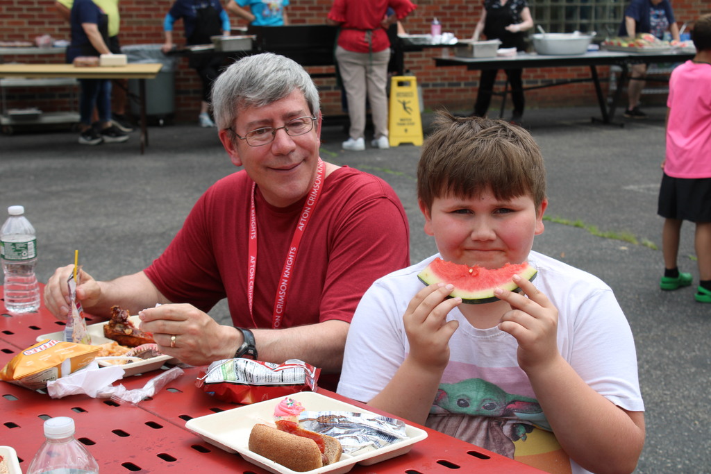 People eating at picnic