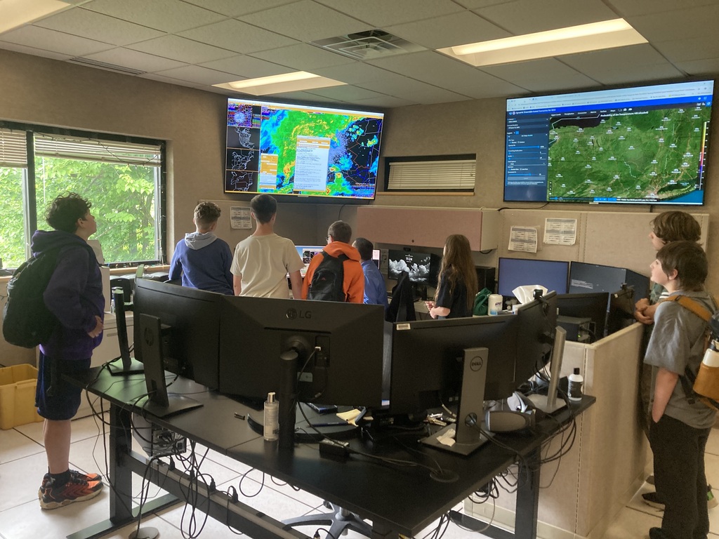 Afton STEP students at the Weather center with large weather tv.