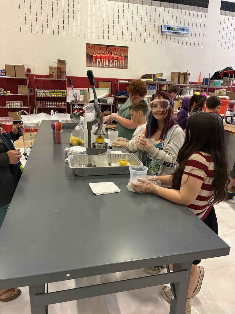 Afton FFA students with goggles at table