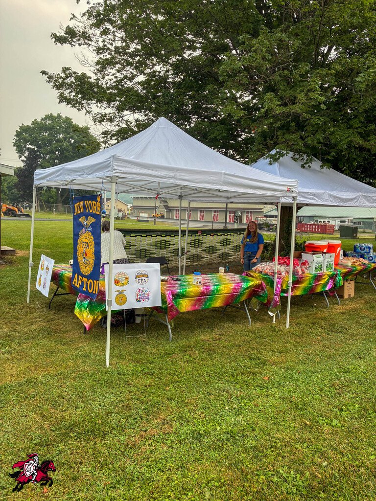 A photo of the Afton FFA booth at Dairy Day at the Chenango County Fairgrounds