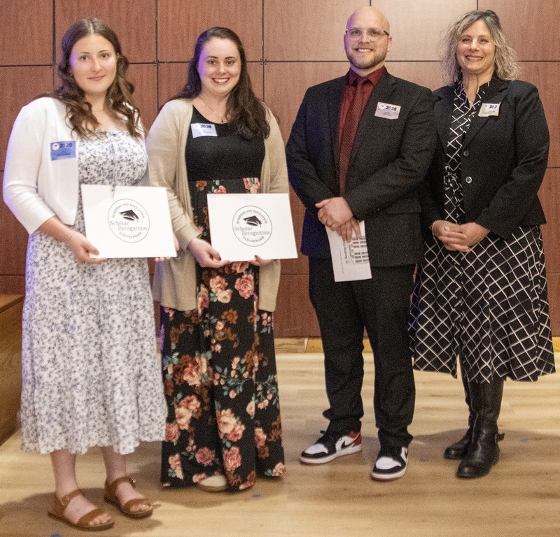 Emilie Hopkins with Mr. Carle Ms. Hammond and Ms. Smith 