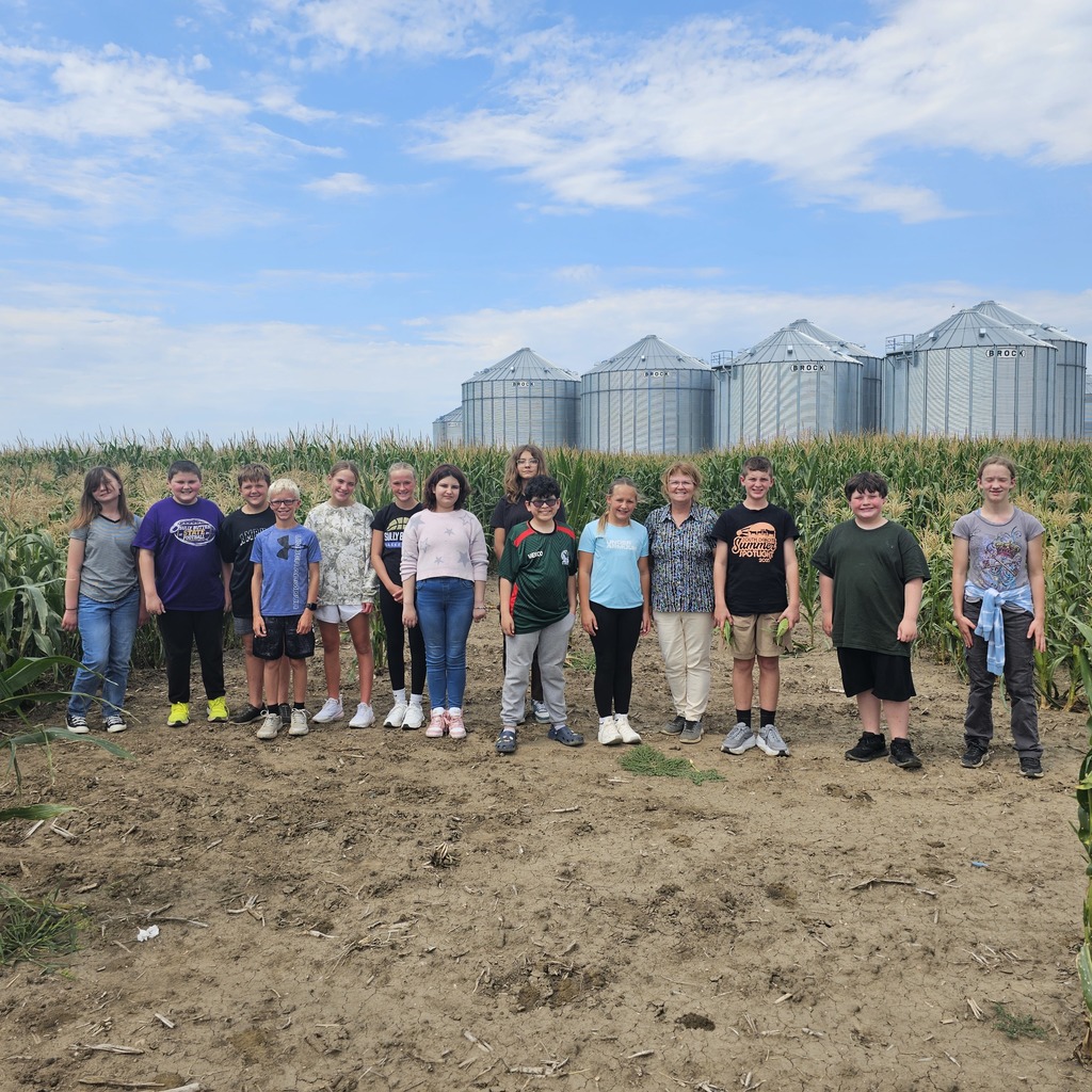 Mrs. Hill with the 6th grade group. It was a hot day, and we all learned more about corn sweat! 