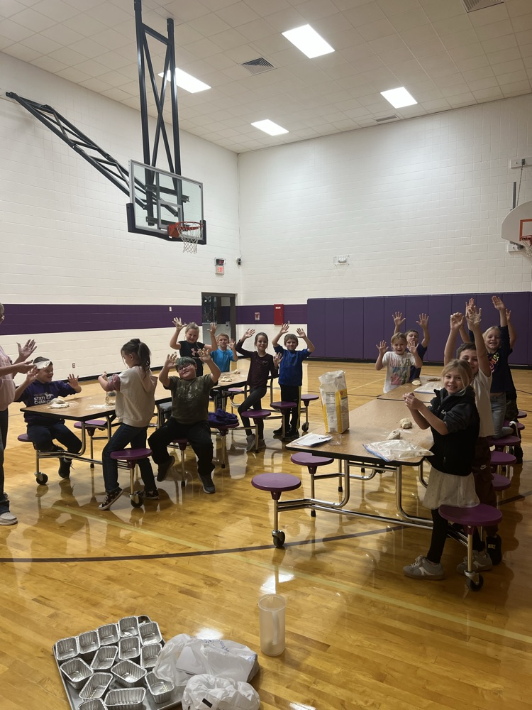 Second Grade sticky hands are part of making bread in a bag in Ag in the Classroom!