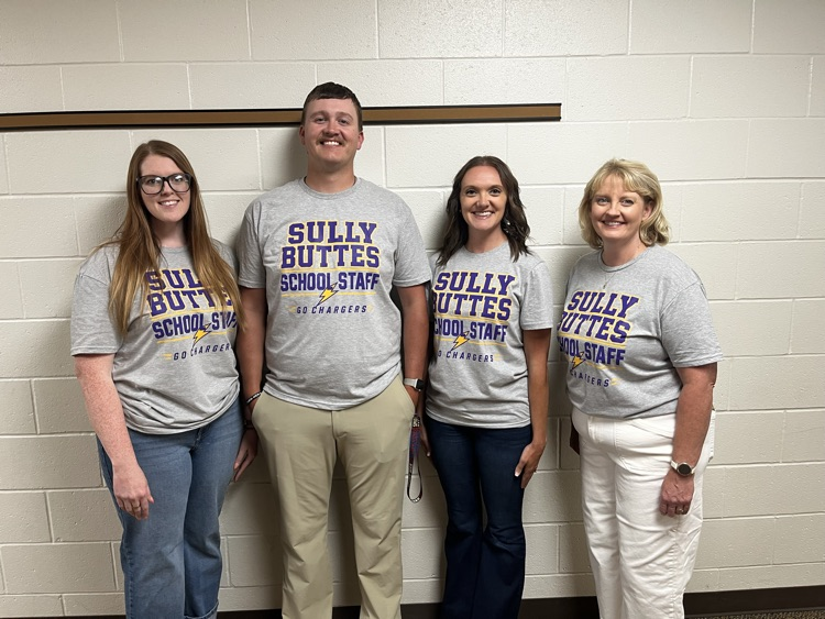 staff in donated t-shirts 