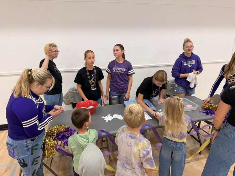 cheerleaders giving spirit tattoos