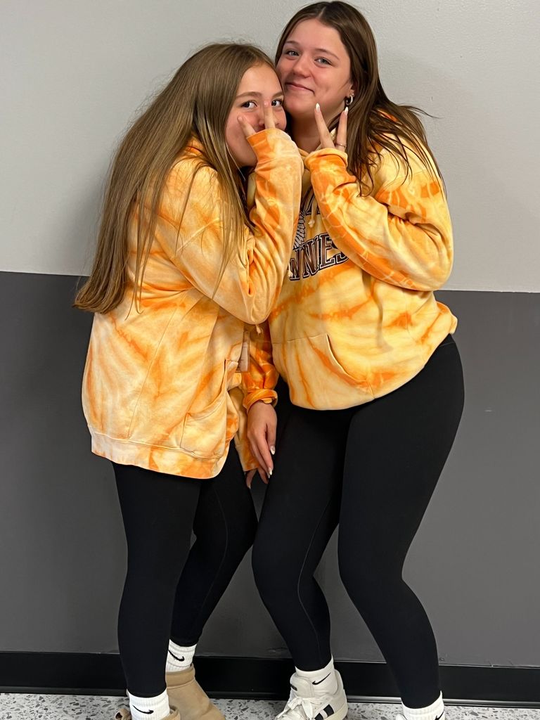 students dressed alike agawam hoodies and black leggings