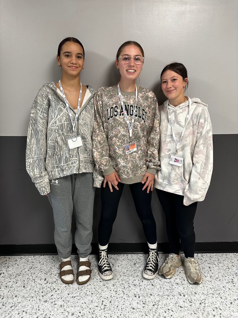 students wear camo hoodies