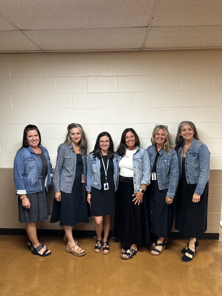 staff where same black skirt and jean jacket