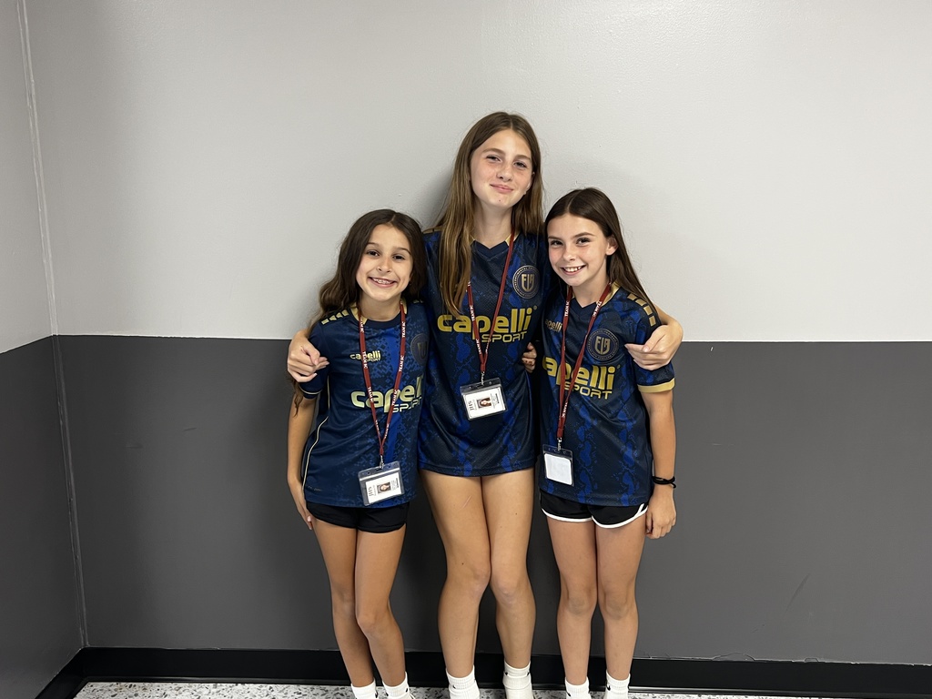 3 students wearing capelli sports tshirts 