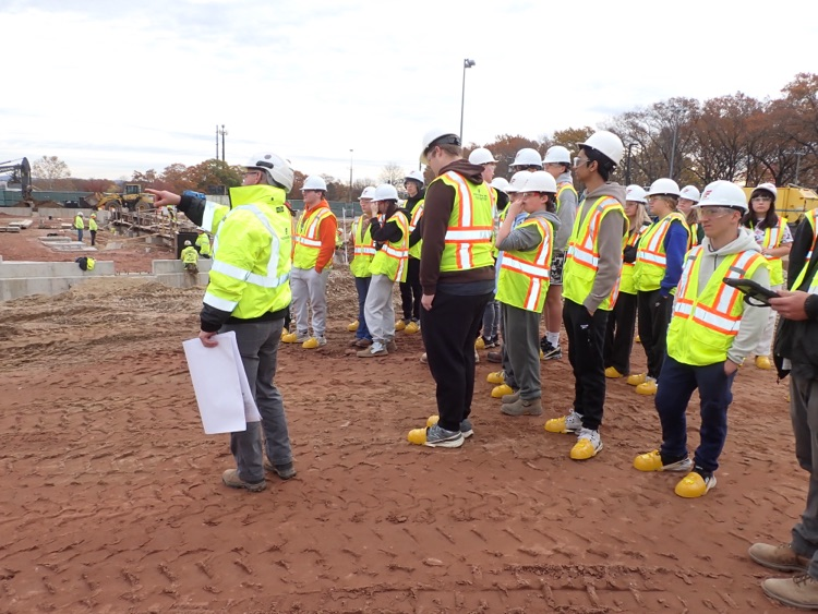 students viewing the construction site