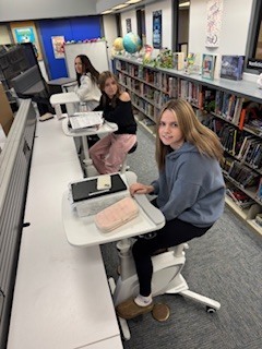 staff working on stationary bikes