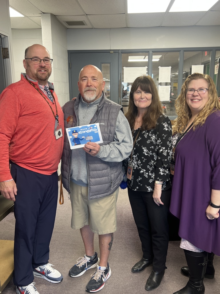 4 staff presenting certificate