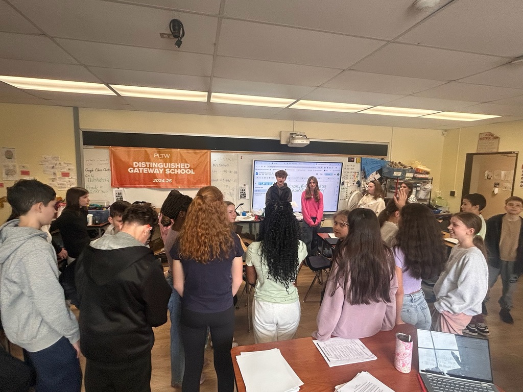 Peer leaders speaking to Doering Students