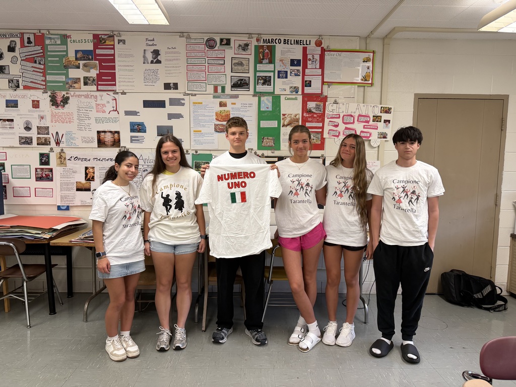 tarantella winners with white tee shirts