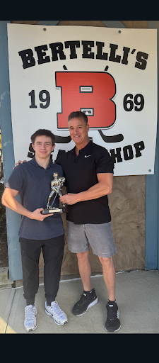 Senior Anthony Barbarini accepts an award