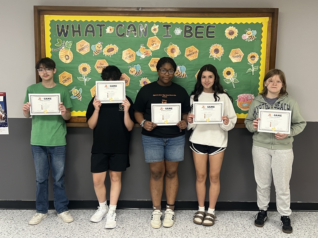 students posing with award certificate