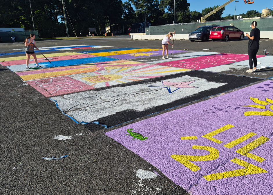AHS senior students painting their parking spots