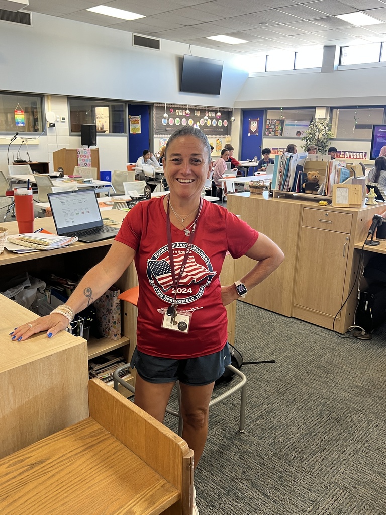 teacher wearing red white blue