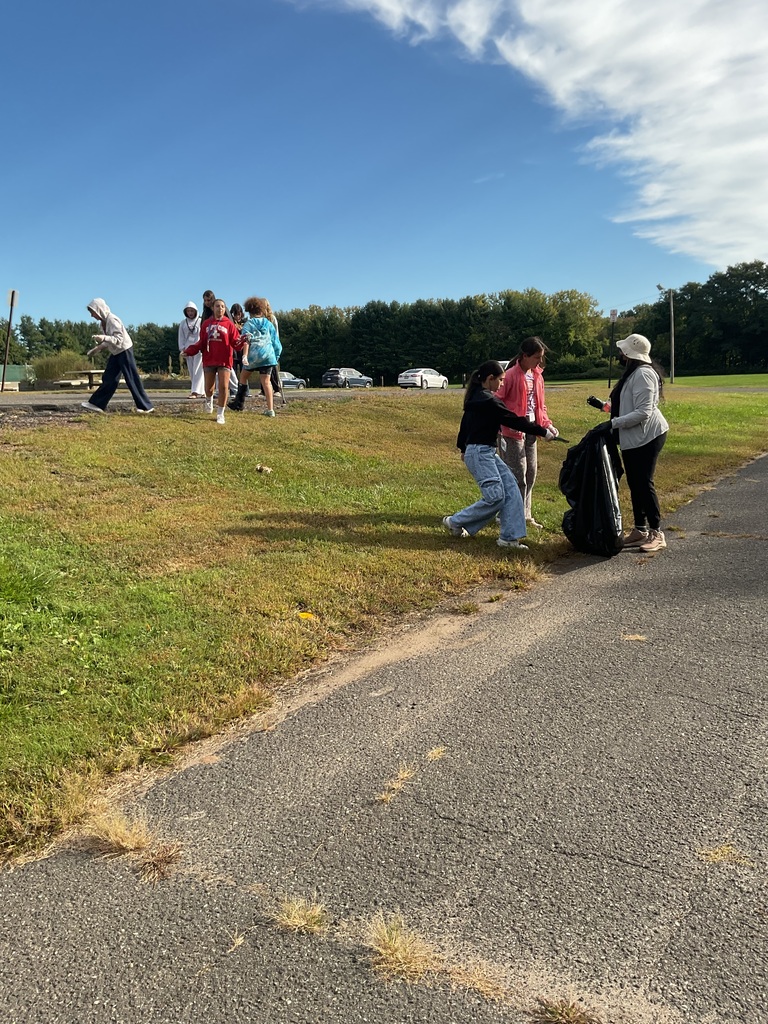 students picking up trash