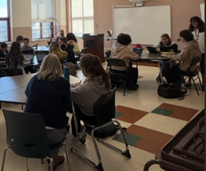 counselors helping students with college applications