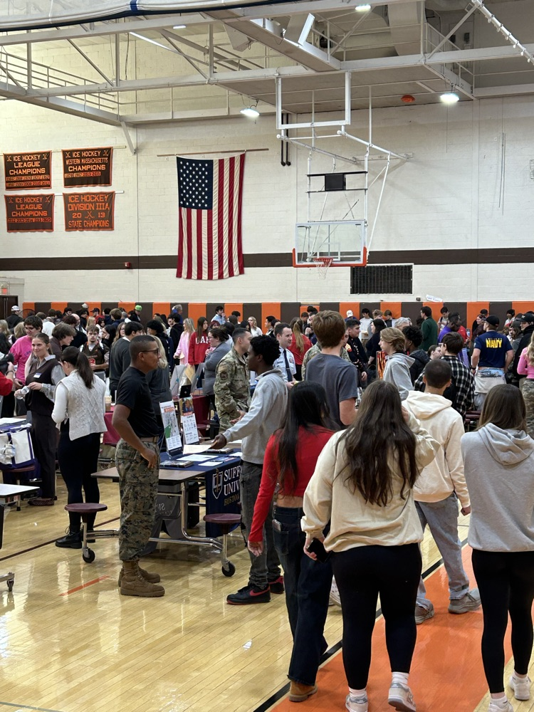 students and college’s representatives in the gymnasium