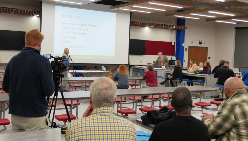 Community meeting taking place in Wagener-Salley Cafeteria.