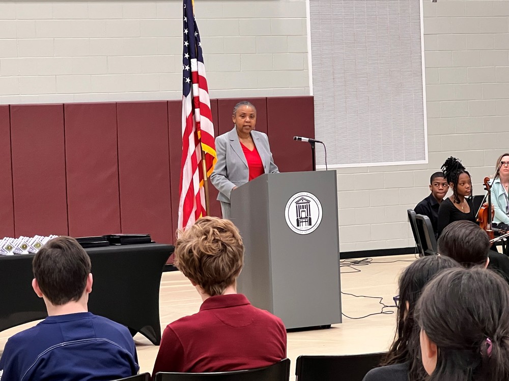 Phyllis Gamble at Podium.