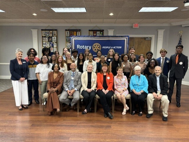 Rotary Club of Aiken Scholarship winners pose with community and educational leaders.