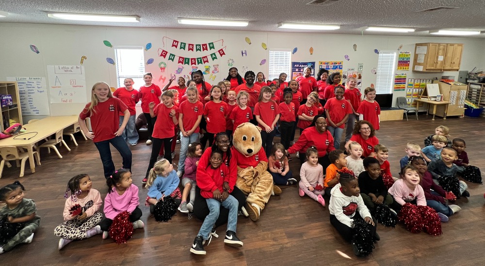 Spirit team at daycare with children.