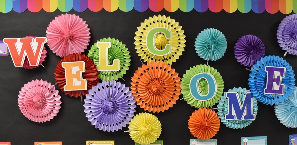Wall decor spelling out "Welcome".